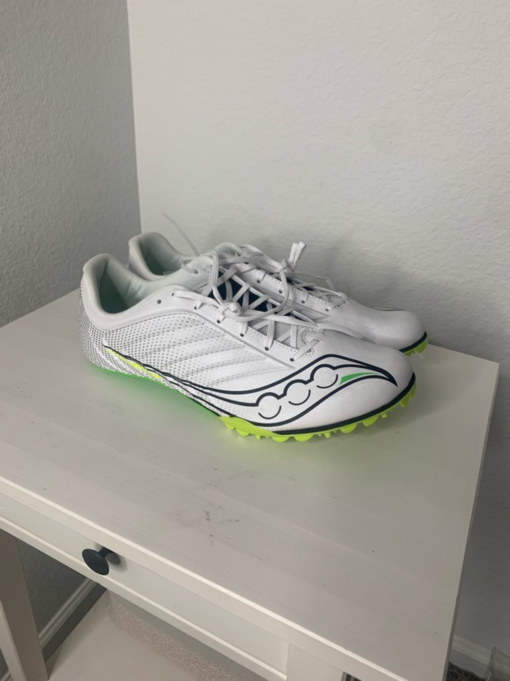 Men’s Saucony White Track Spikes with Neon Green Accents size 12 never been worn